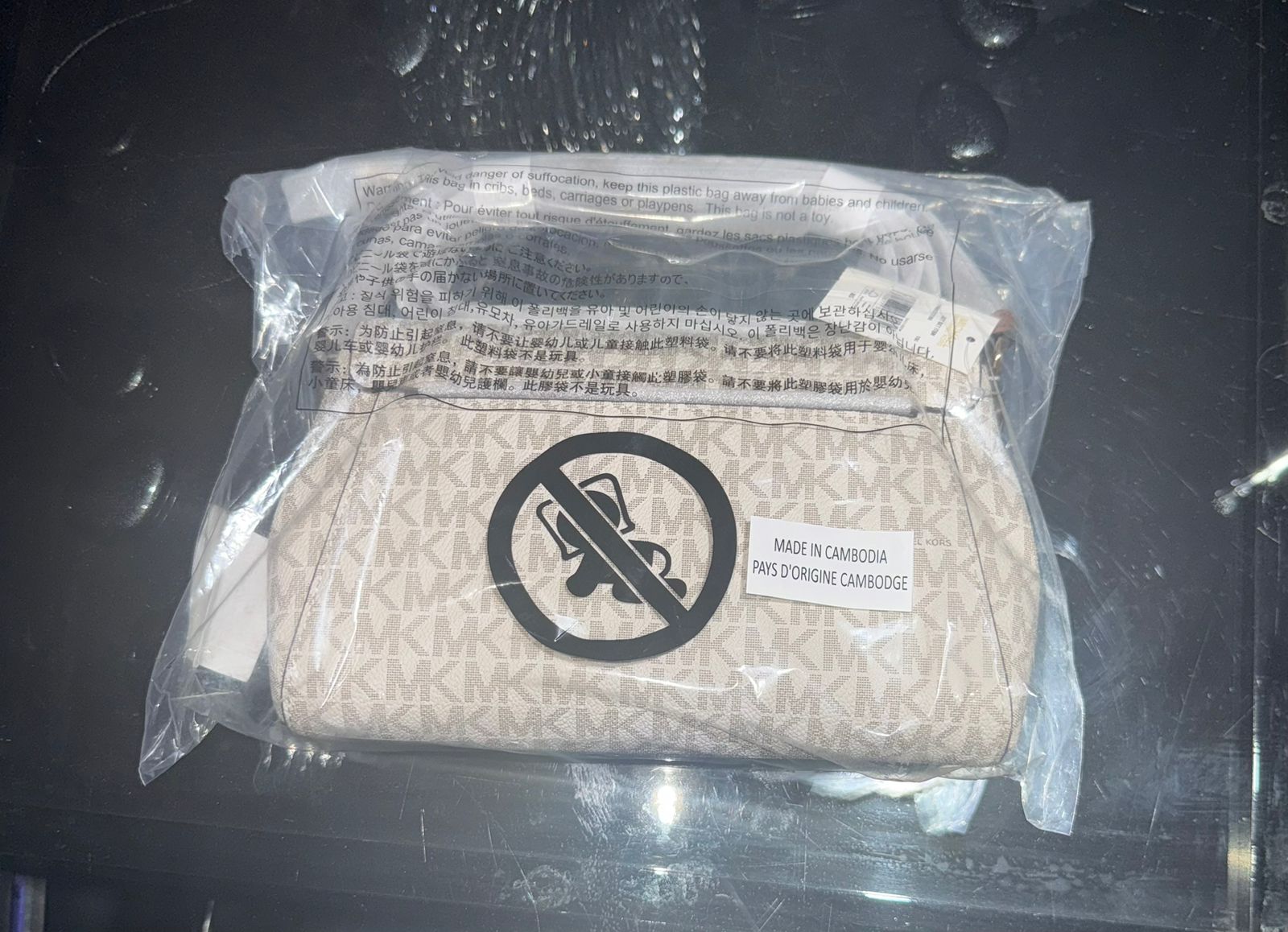 Rifa beneficente bolsa Michael Kors